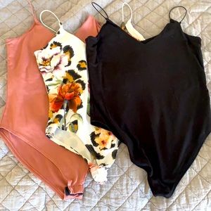 Two bodysuits. Great condition!